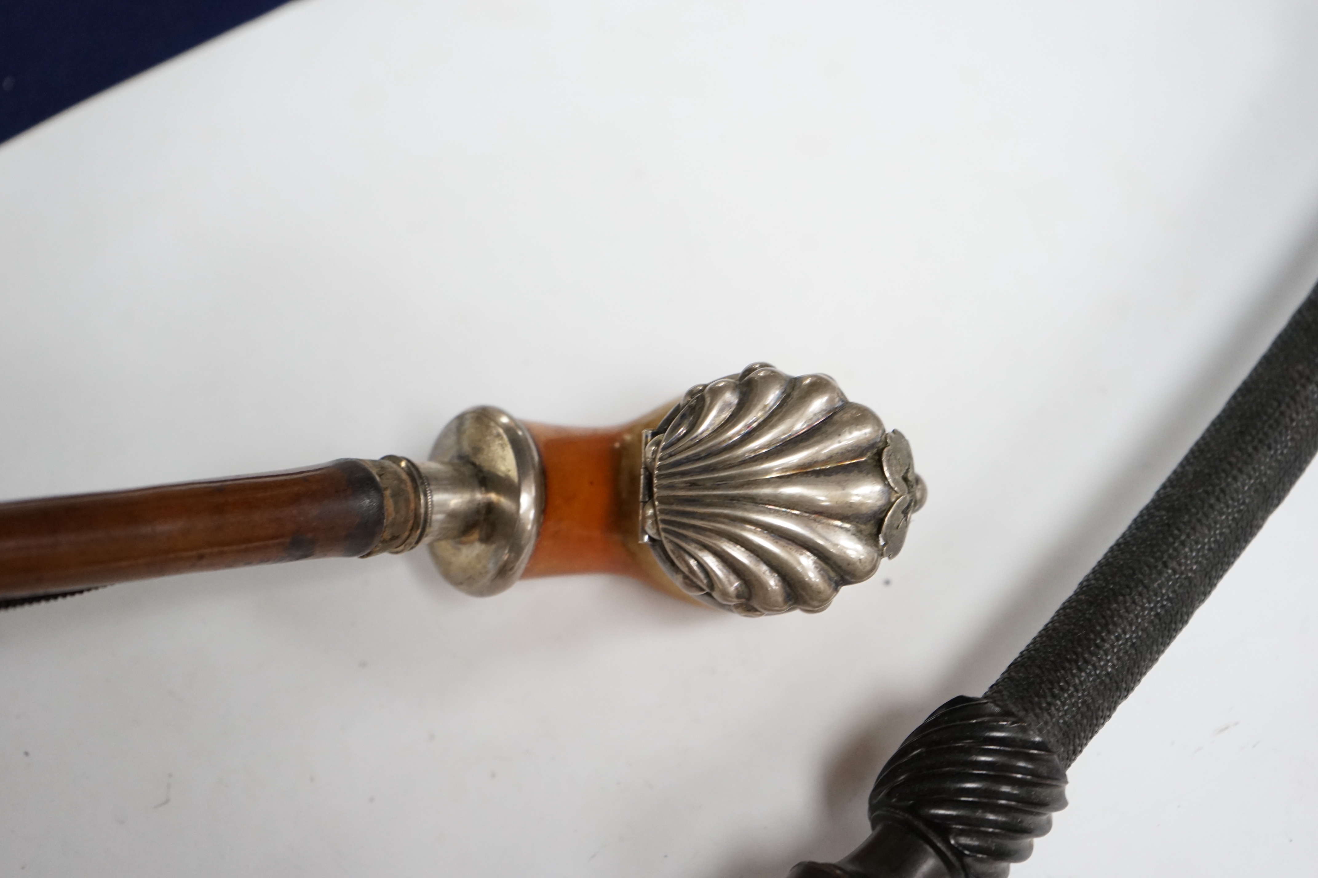 Ten mixed novelty pipes in various sizes with various mixed bowls, together with a small collection of mostly amber mouthpieces and other smoking related items, largest pipe 61cm long